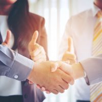 business-making-handshake-partnership-congratulation-merger-acquisition_28914-3
